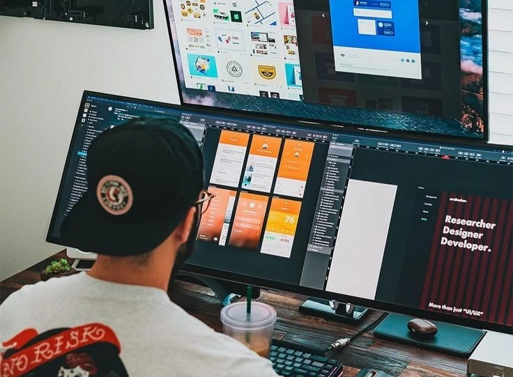 Laptop displaying mobile app development screen