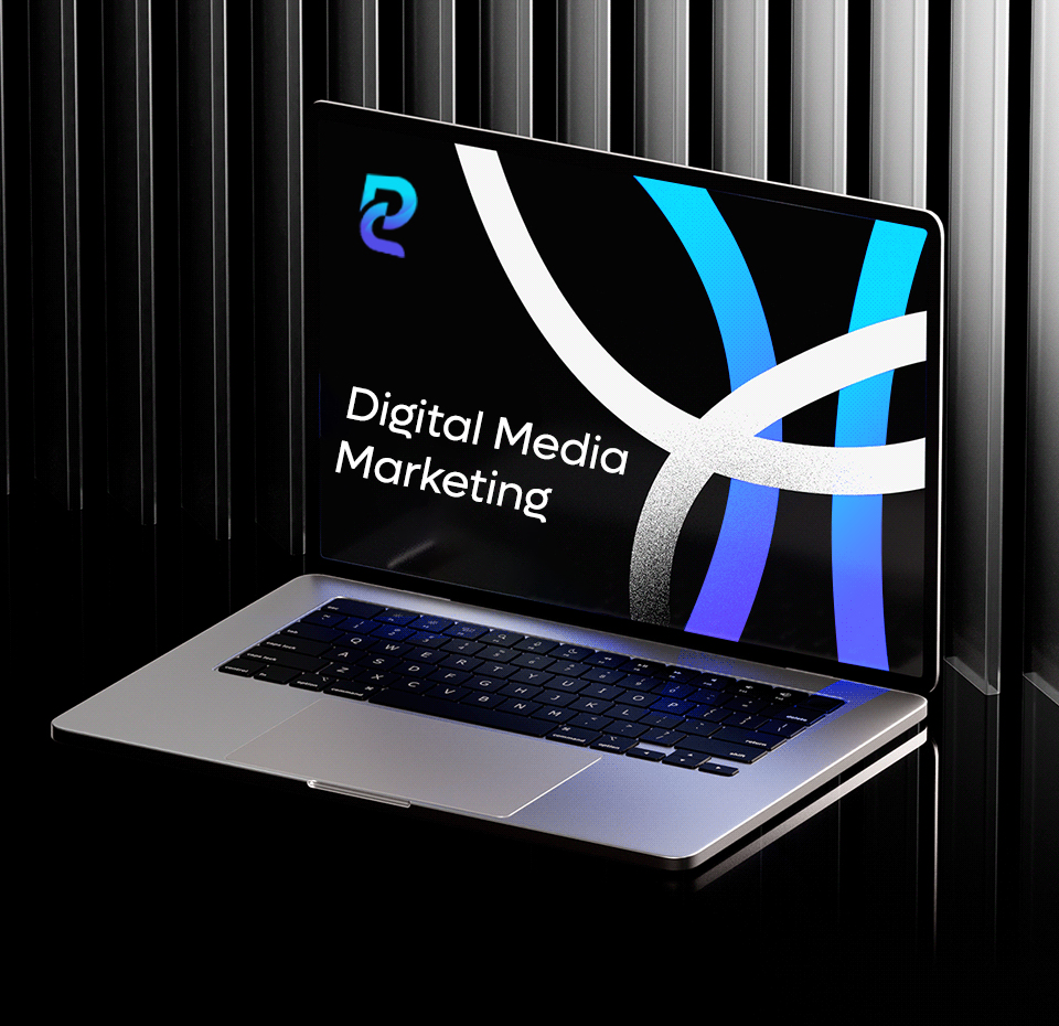 Laptop displaying "Digital Media Marketing" on screen