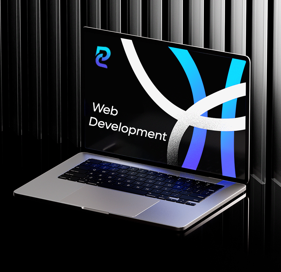Laptop displaying "Web Development" on screen